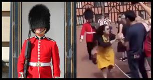 Windsor Castle Royal Guard 'Loses Cool,' Shoves Female Tourist Out Of The Way Windsor Castle Royal Guard 'Loses Cool,' Shoves Female Tourist Out Of The Way