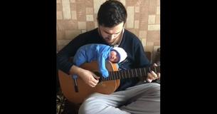 Chill Dad Serenading His Newborn To Sleep While It Rests On His Guitar Is 2019's Must-See Concert Chill Dad Serenading His Newborn To Sleep While It Rests On His Guitar Is 2019's Must-See Concert