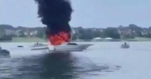 Heroic Mother On Jet Ski Sees Boat On Fire And Rushes To Rescue Four Kids Trapped Inside. Heroic Mother On Jet Ski Sees Boat On Fire And Rushes To Rescue Four Kids Trapped Inside.
