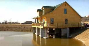Man Builds House Over Pond So He's Able To Fish From His Living Room Man Builds House Over Pond So He's Able To Fish From His Living Room
