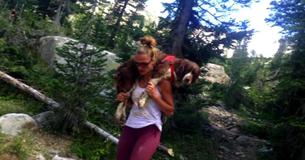 Woman Discovers Injured 55-Pound-Dog On Mountain, Carries Him 6 Hours On Her Back To Save Him Woman Discovers Injured 55-Pound-Dog On Mountain, Carries Him 6 Hours On Her Back To Save Him