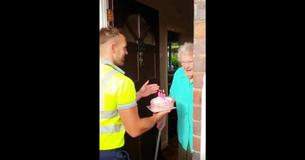 Elderly Woman In Tears When Her Garbage Collectors Arrive At Front Door With A Cake To Celebrate Her 100th Birthday Elderly Woman In Tears When Her Garbage Collectors Arrive At Front Door With A Cake To Celebrate Her 100th Birthday