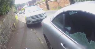 Officer Smashes Car Window To Rescue Dog Locked Inside Officer Smashes Car Window To Rescue Dog Locked Inside