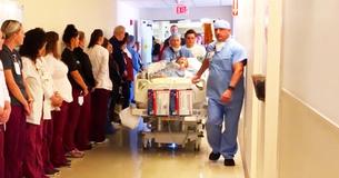 100 Hospital Employees Line Halls For A Heartwarming Tribute To Nurse 100 Hospital Employees Line Halls For A Heartwarming Tribute To Nurse