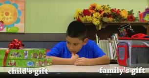 Children Choose Between Gift For Themselves Or For Their Family As Parents Watch Children Choose Between Gift For Themselves Or For Their Family As Parents Watch