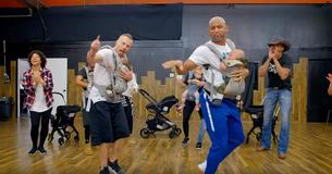 Parents Take To Dancefloor With Smooth Moves With Babies Strapped To Their Chests Parents Take To Dancefloor With Smooth Moves With Babies Strapped To Their Chests