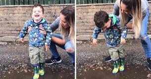 Two-Year-Old Toddler With Cerebral Palsy Went Out On Rainy Day And Splashed Around In Puddle For The First Time Two-Year-Old Toddler With Cerebral Palsy Went Out On Rainy Day And Splashed Around In Puddle For The First Time