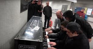 Four Musicians Gather Around A Piano To Play Boogie-Woogie Music In A Subway Station Four Musicians Gather Around A Piano To Play Boogie-Woogie Music In A Subway Station