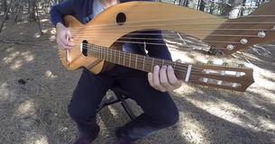 Man Playing ‘The Sound Of Silence' On 18-String Harp Guitar Is More Wonderful Than Words Can Say Man Playing ‘The Sound Of Silence' On 18-String Harp Guitar Is More Wonderful Than Words Can Say