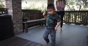 Young Boy With Cerebral Palsy Successfully Takes First Steps As His Family Cheers Him On Young Boy With Cerebral Palsy Successfully Takes First Steps As His Family Cheers Him On