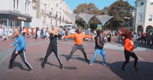 Dancers Perform Incredible '80s-Themed Flash-Mob In Seaside Town Dancers Perform Incredible '80s-Themed Flash-Mob In Seaside Town