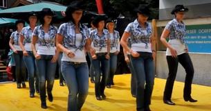 Dancers Perform Jaunty Line Dance To Classic Country Bop Dancers Perform Jaunty Line Dance To Classic Country Bop