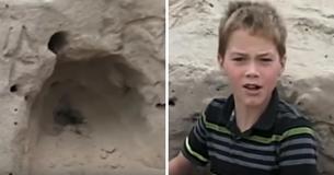 11-jarige jongen die op strand speelt, vindt een klein meisje dat levend in het zand begraven is en komt onmiddellijk in actie 11-jarige jongen die op strand speelt, vindt een klein meisje dat levend in het zand begraven is en komt onmiddellijk in actie
