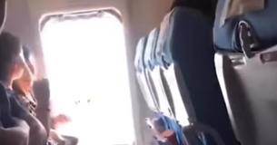 Passenger Opens Airplane's Emergency Door On Runway Because She 'Felt Stuffy' Passenger Opens Airplane's Emergency Door On Runway Because She 'Felt Stuffy'