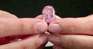 'Ultra-Rare' Purple-Pink Diamond Purchased At Auction For Record Price $26.6M 'Ultra-Rare' Purple-Pink Diamond Purchased At Auction For Record Price $26.6M