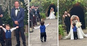 Excited Toddler Ring Bearer Runs Down The Aisle To Greet His Mother Excited Toddler Ring Bearer Runs Down The Aisle To Greet His Mother