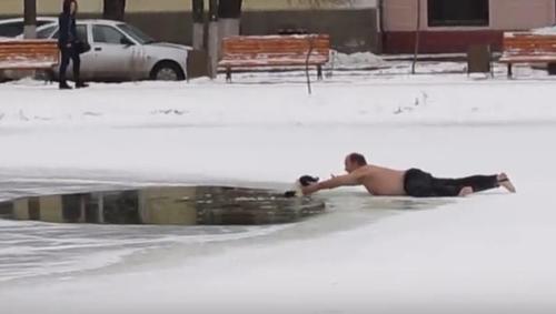 Drowning Dog Cries Out For Help From Frozen Pond, Finally Hero Runs Onto Ice And Rips Off Clothes